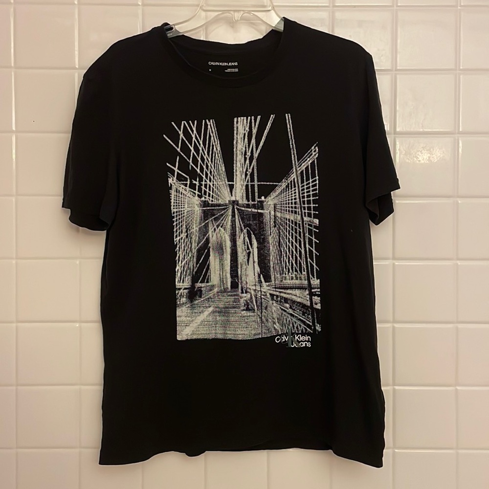 Calvin Klein Jeans black, short sleeves tee shirt. Size M, front graphic…